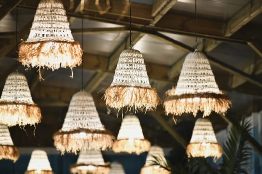 Wicker lamps hanging at the ceiling