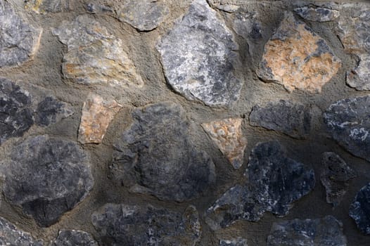 Rugged stones blend harmoniously with muted shades, illuminated by gentle sunlight, creating an enchanting atmosphere.