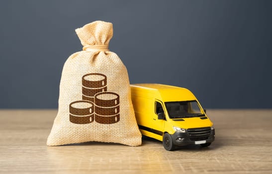 Delivery van and big money bag. Logistics industry, driver shortages. Supply chain resilience. Invest in electric and autonomous vehicles. Freight transportation.