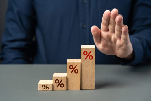 Businessman stops interest growth. Stop rising inflation or debt. High taxes, financial burden on business. Suffers losses. Tax burden. Refinancing, restructuring of loans. Falling demand, bankruptcy.