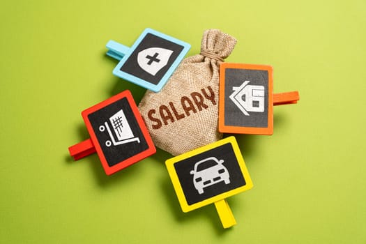 Salary and expenses. The money bag and attached signs symbolize expense items. Financial management and spending planning. Economics and business. Investments and diversification of funds.