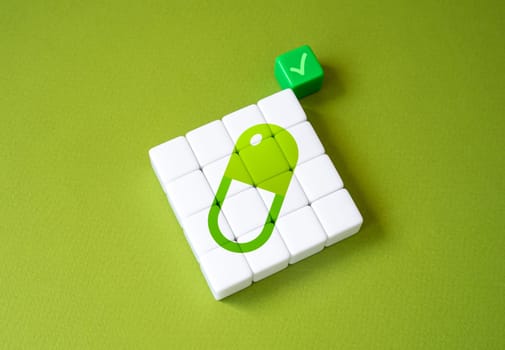Medical capsule tablet and green tick. Medicine approved for use. Clinical trials. Prescription for purchasing medicines. Recommendations and certification of drugs from regulatory authorities.