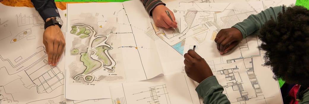 Urban planning team at a table, working on sketches and eco-conscious designs for future cities.