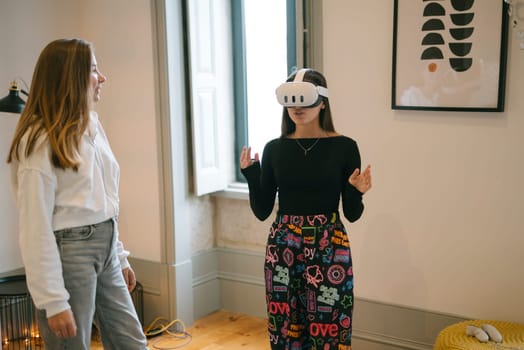 A girl enjoys a VR experience while an observer highlights modern technology and creative expression today