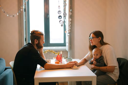 A warm family scene showcasing the deep connection and love in a shared moment with their precious baby