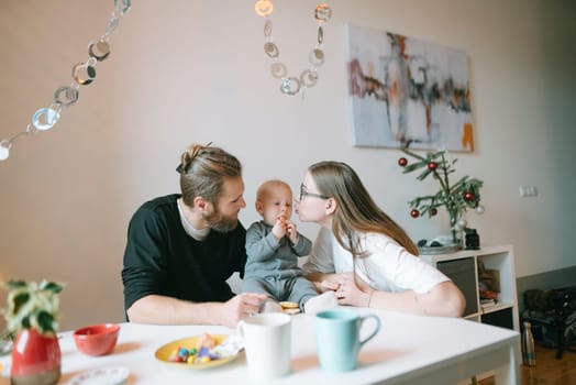 A loving family enjoys a delightful breakfast together, showcasing warmth and connection in their cozy home