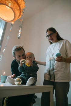 A wonderful family enjoys precious quality time together, showcasing love, laughter, and playfulness in a cozy setting