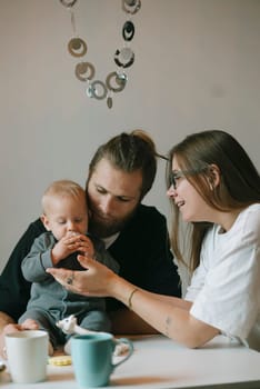 A beautiful moment between loving parents and their adorable baby, showcasing true love and family connection