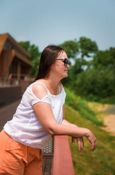 portrait of 36 years old russian woman in sunglasses on the summer day