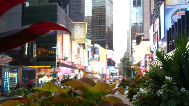 New York City, United States - 14 Sept 2023: Times Square, Manhattan Midtown Broadway street, USA. American NYC urban life. Defocused people. Advertising signs, commercial ads, billboard screens glows