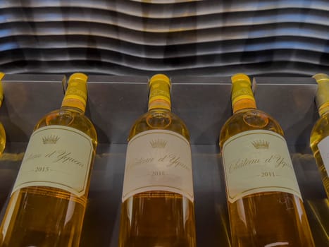Two bottles of 2018 Sauternes wine are elegantly presented, highlighting the rich color and luxurious design that signifies a high-quality vintage selection.