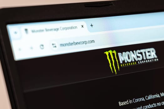 New York, USA - January 26, 2025: Monster Beverage Corporation website displayed on a laptop screen, highlighting energy drink branding and company information