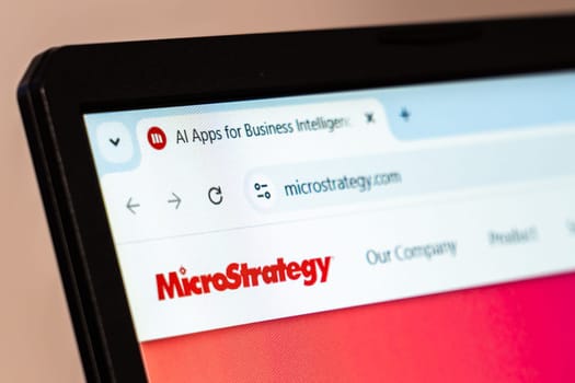 New York, USA - January 26, 2025: MicroStrategy website displayed on a laptop screen, showcasing trusted data analytics and business intelligence solutions