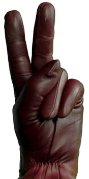 Hand in a burgundy leather glove showing a peace or victory gesture, isolated on a white background. Perfect for fashion promotions, accessory advertising, symbolic concepts, and creative design