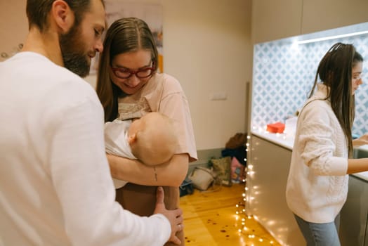 A heartwarming and delightful scene of a loving family enjoying quality time together with their baby at home
