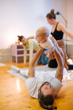 Join us for a calming yoga session to enhance the bond between parent and baby in a peaceful environment