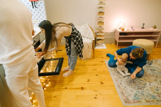 A warm and inviting family moment featuring a baby, showcasing a beautifully decorated and cozy space