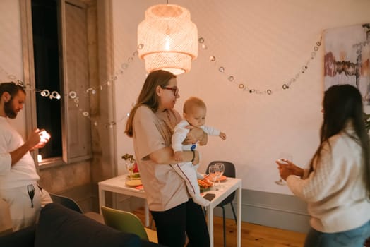A heartwarming family moment as parents connect with their child in a stylish, lovefilled living room
