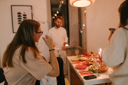 A warm dinner party with close friends, joyfully celebrating with delightful food and shared laughter
