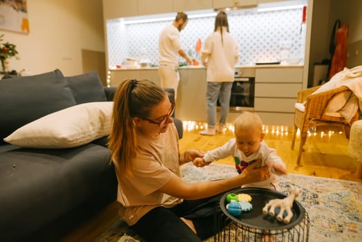 A beautiful, warm moment filled with nurturing, caregiving, and joyful playtime in a cozy family environment
