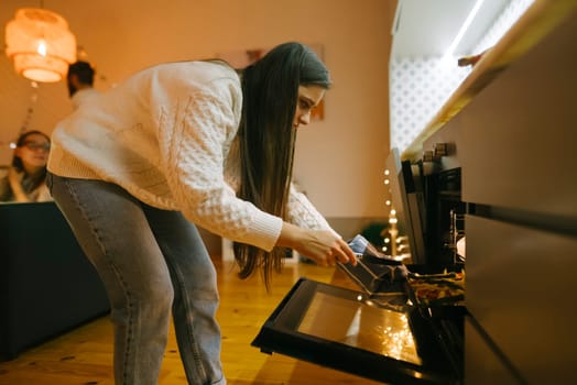In a stylish kitchen, a woman prepares a meal that captures the essence of home cooking with love and care