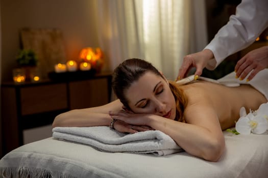 A soothing massage scene that promotes relaxation and wellness in a tranquil spa dedicated to calmness