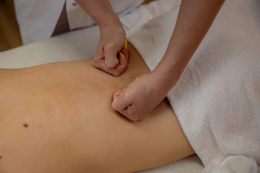 A highly skilled therapist skillfully applying targeted pressure during a soothing therapeutic massage session