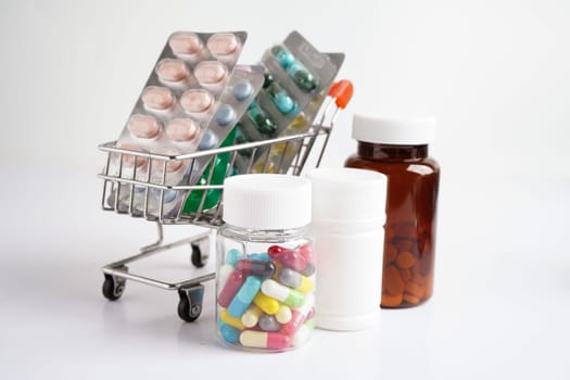 Shopping trolley with blister pill and capsule from drug prescription, pharmacy for treatment health medicine.