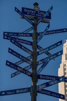 Los Angeles City way sign for sister cities internationally. Blue sky and portion of gleaming city hall in background. International trade or culture concept and peace. High quality photo