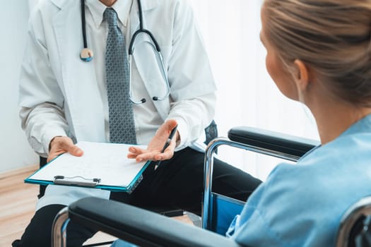 Doctor in professional uniform examining patient at hospital or medical clinic. Health care , medical and doctor staff service concept. Jivy