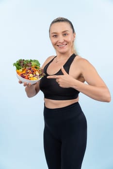 Happy smile senior woman portrait holding bowl of vegan fruit and vegetable on isolated background. Healthy senior people with healthy vegetarian nutrition and body care lifestyle. Clout