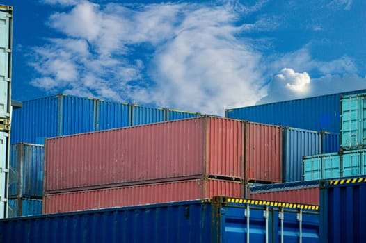 Image of large shipping containers stacked on top of each other.