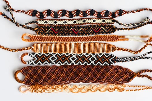 DIY woven friendship bracelets with different braiding. Summer accessory
