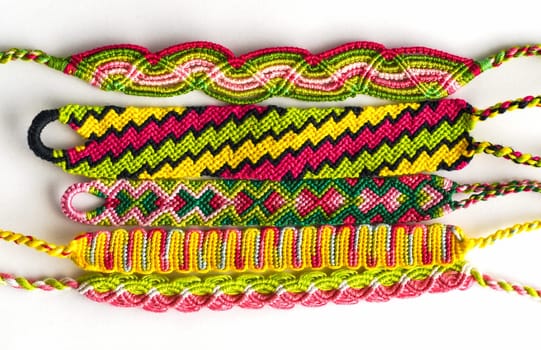 DIY woven friendship bracelets with different braiding. Summer accessory