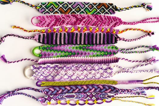 DIY woven friendship bracelets with different braiding. Summer accessory