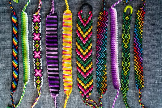 DIY woven friendship bracelets with different braiding. Summer accessory