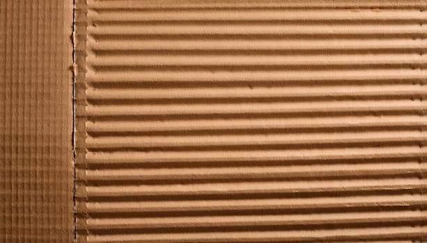 brown recycled corrugated cardboard texture useful as a background, AI generated image