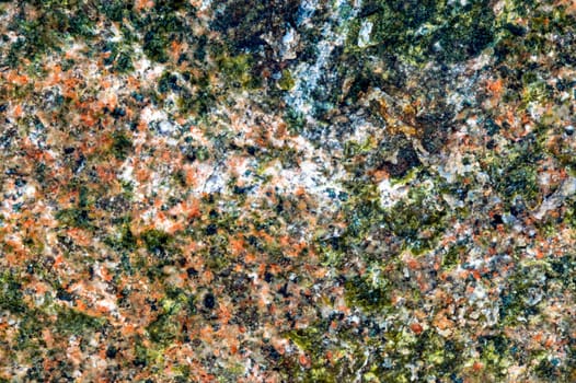 Blurred and unfocused marble wall background with mixed colors. More brown tint