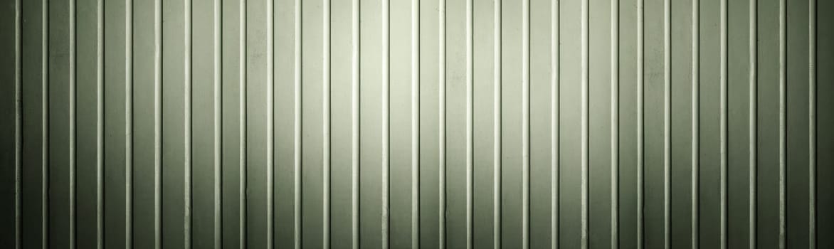 Closeup view of the wall. Abstract pattern of a wall with vertical ribbed lines. Mockup. Copy space. Wallpaper or texture background