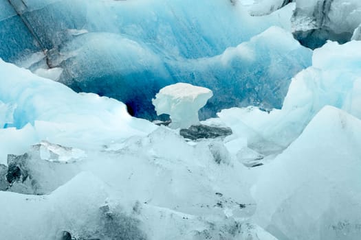 View of the melting glacier on Jokulsarlon or Jökulsárlón Glacier Lagoon, Iceland. Nature, travel, climate change, global warming, winter background, or wallpaper