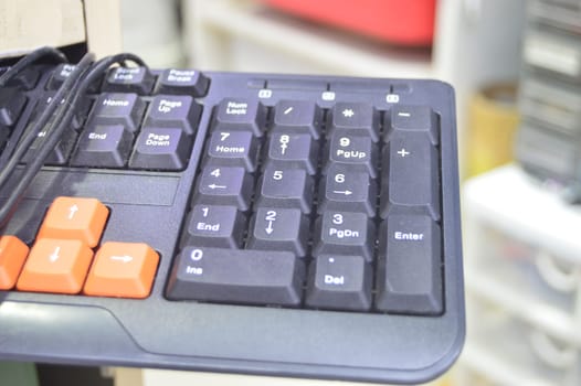 Close-up view of keyboard with numbers side