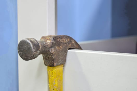 Close-up photo of hammer head, old condition.