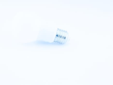  White light bulb. Very bright. On a white background, the concept is intended to give a bright light. use as wallpaper            