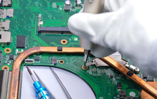 View from the top while a technician is fixing the motherboard.