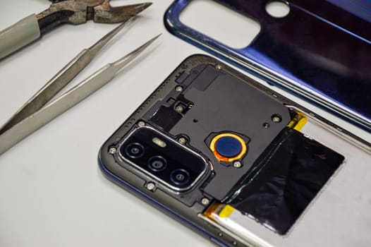 The back corner of the mobile phone has been removed.