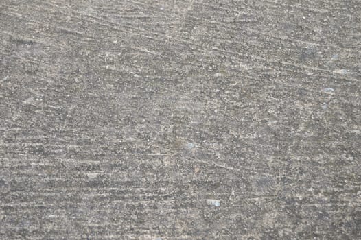 Rough cement surface, used as a background image.