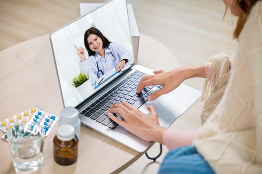 Sick woman video call online with laptop consult with doctor with pills of delivery package at home, sick female covered blanket searching medical online information, Medicine and healthcare