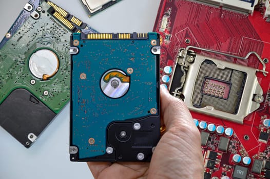 Hard disk drives are still widely used. hard drive in hand