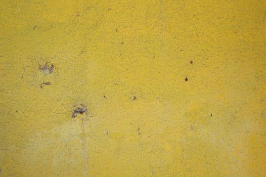 The yellow walls are dirty and old. use as wallpaper