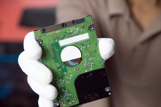 Hard disks are still popular in use today, holding a hard disk in your hand.